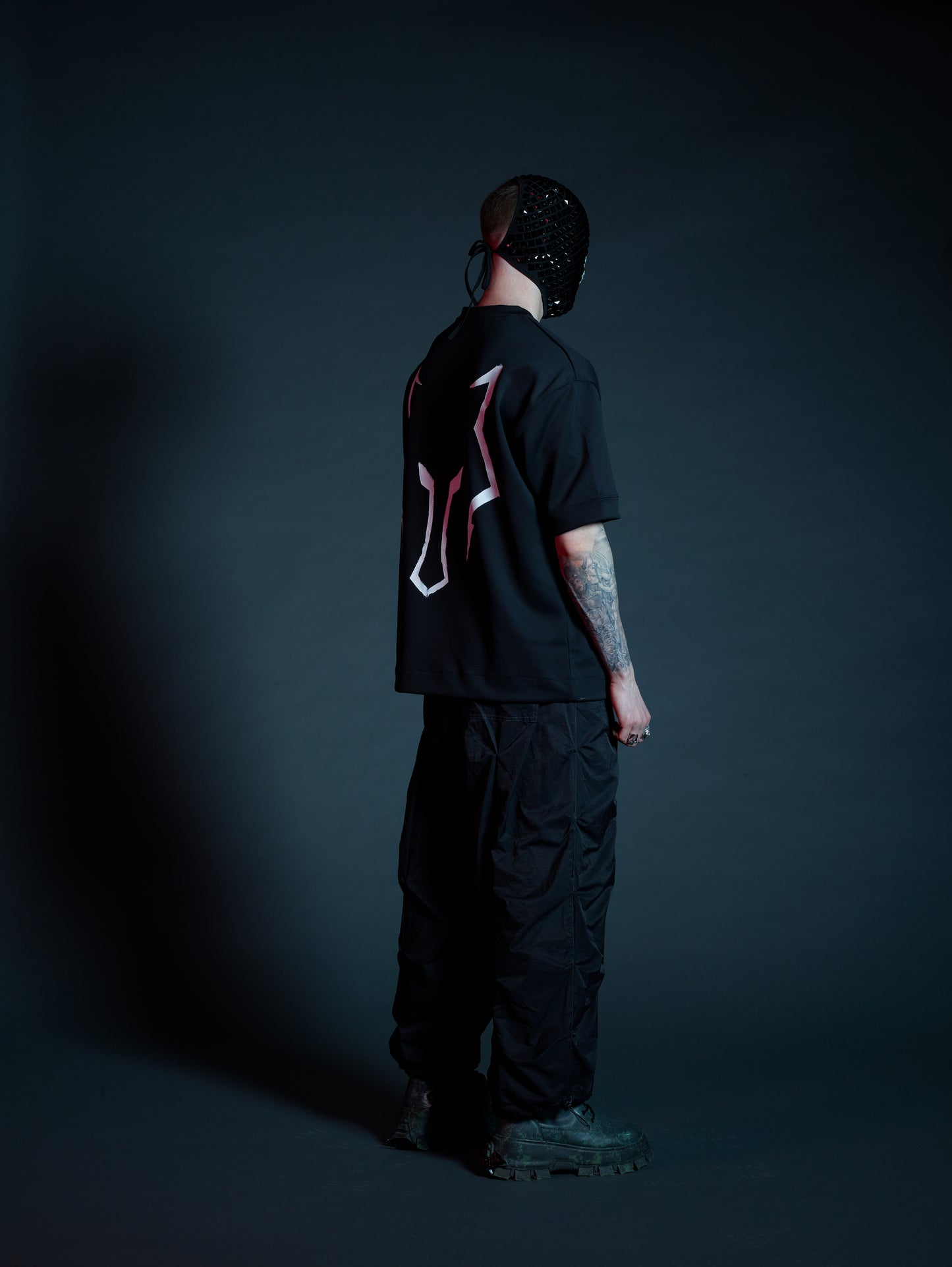 Martial oversized cargos laid flat highlighting structure and texture