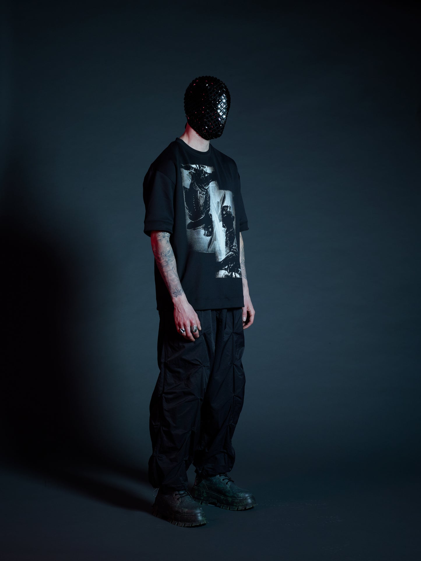 Miyamoto neoprene t-shirt mens black right side view, contemporary menswear, vertical mirrored double overlap print, neoprene fabric.