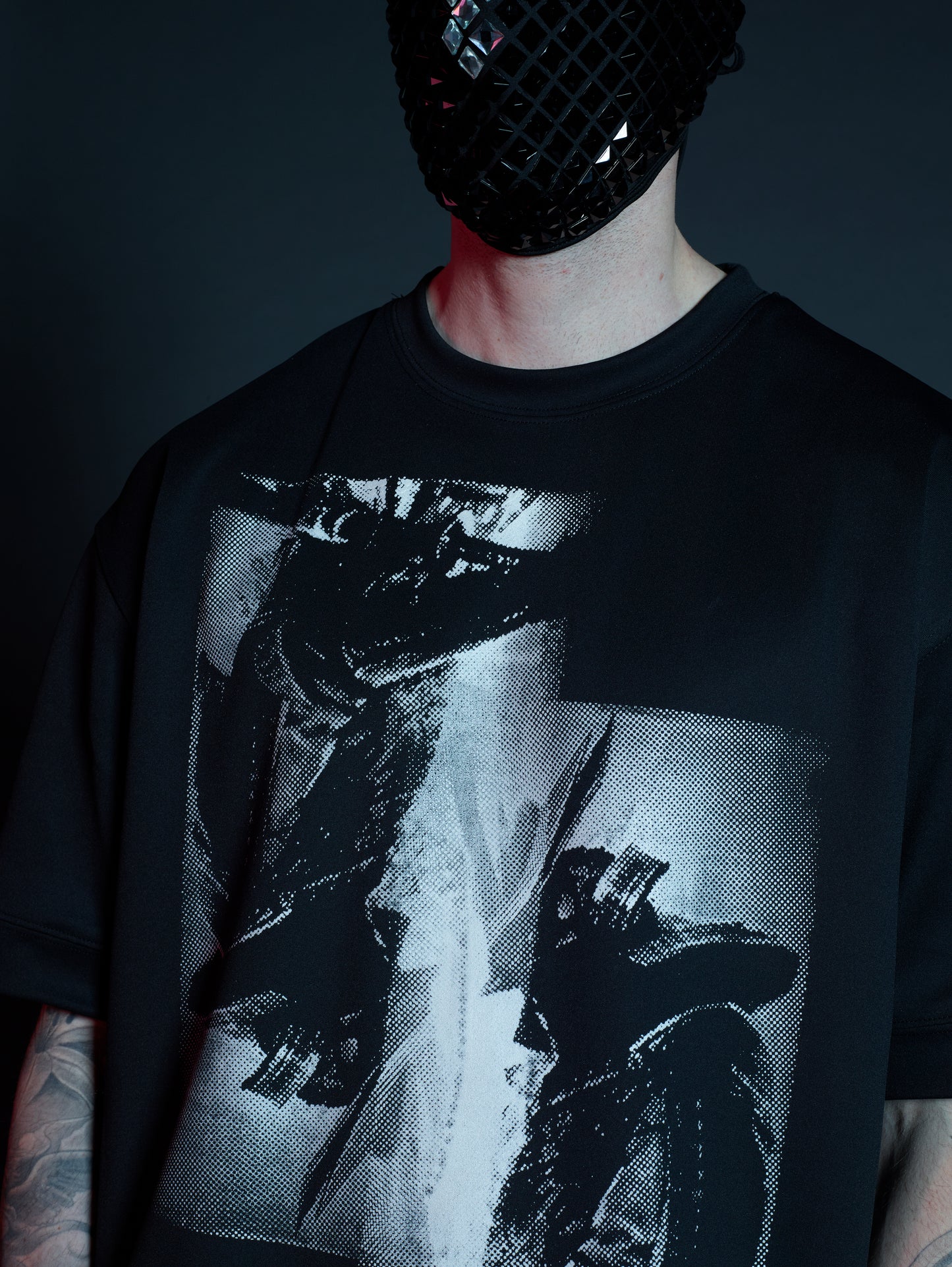 Close-up Miyamoto neoprene t-shirt mens black, detailed vertical mirrored double overlap print, premium neoprene fabric, modern menswear.