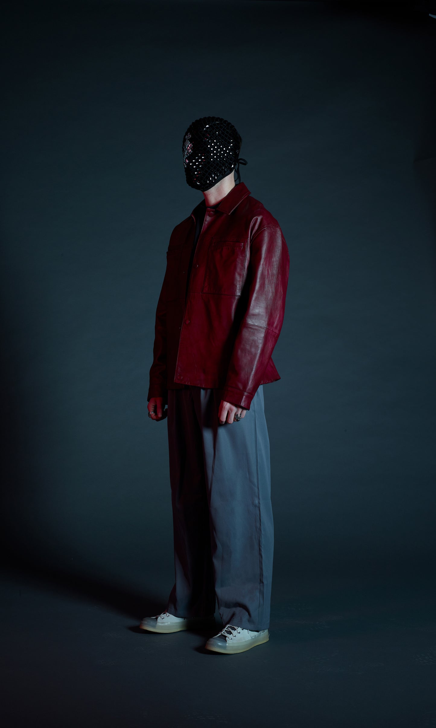 Detail shot of waistband loops on Katana pleated wide leg trousers