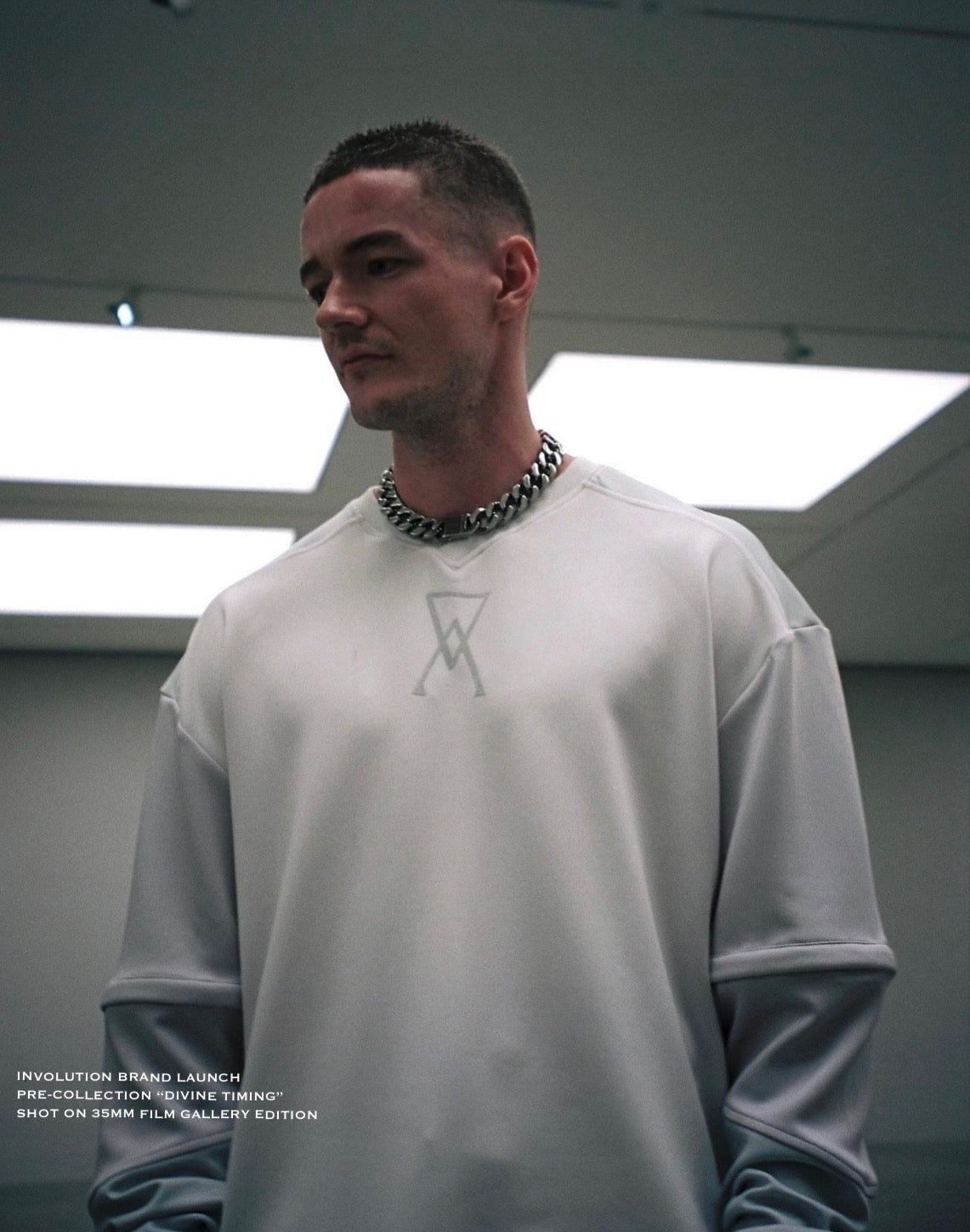 Overhead view of Ascension sweatshirt showcasing V-neck and zip-off sleeves