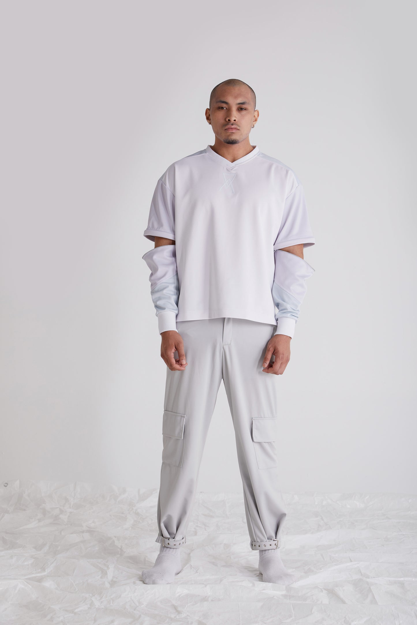 Model wearing Satori wide leg trousers for men with modern silhouette